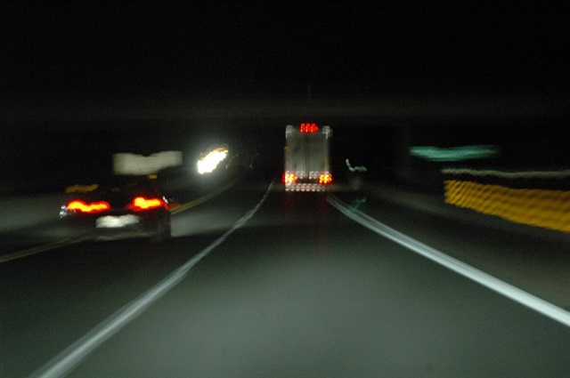 Driving at night can be challenging because of the body’s biologically hardwired tendency to sleep when it’s dark. Lighter traffic densities, however, mean it’s statistically safer. Photo: Jim Park